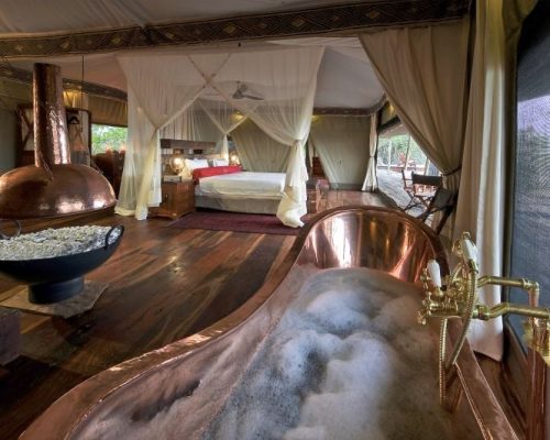 Zarafa-Camp-GreatPlainsConservation-bathtub-bedrooom-view